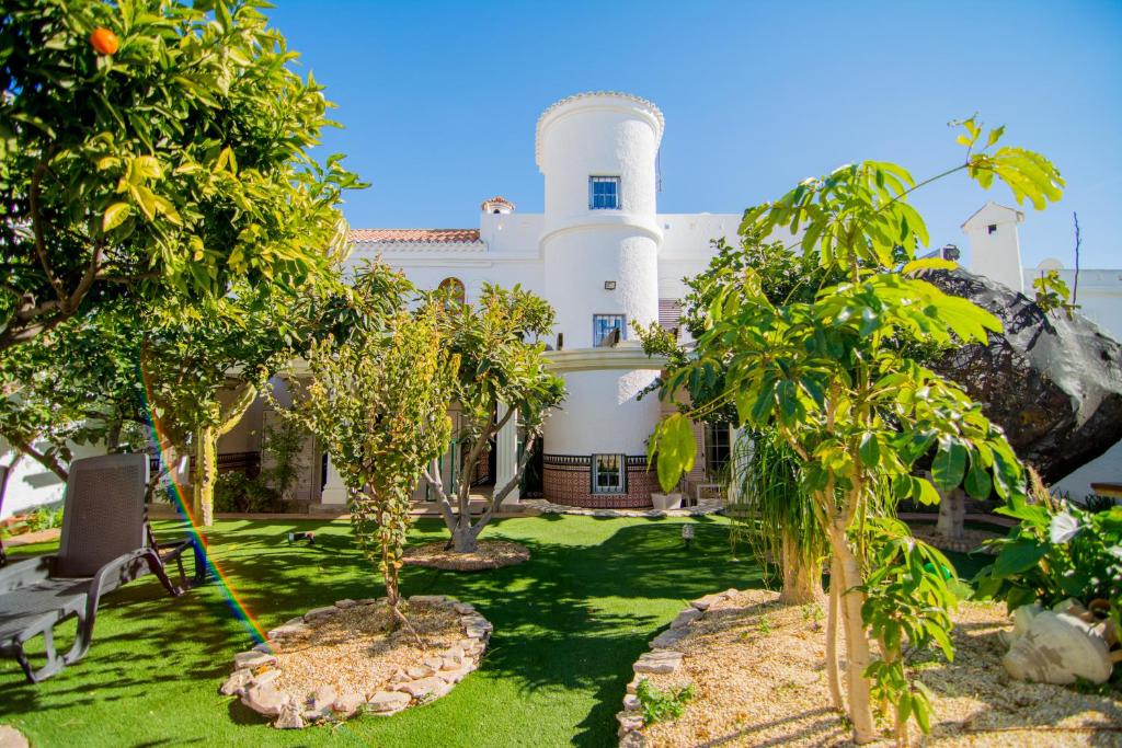 a view of the house from the garden at 16:9 Los Molinos Suites in Almería