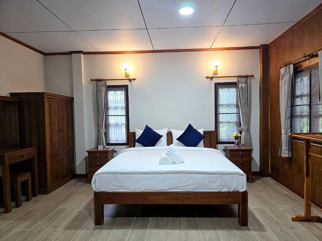 Postel nebo postele na pokoji v ubytování Mira Mare Resort Koh Samui