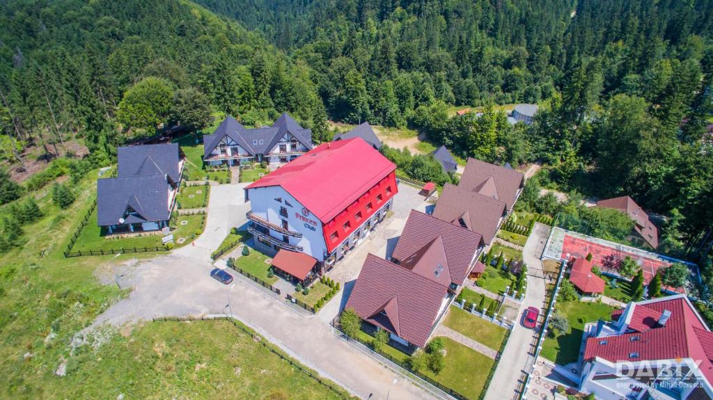 an aerial view of a large house with a red roof at Princess Butique in Poiana Brasov