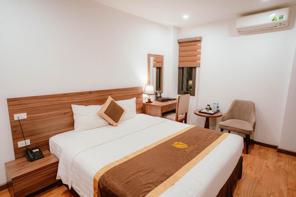 Postel nebo postele na pokoji v ubytování Hotel A89 Rosarian