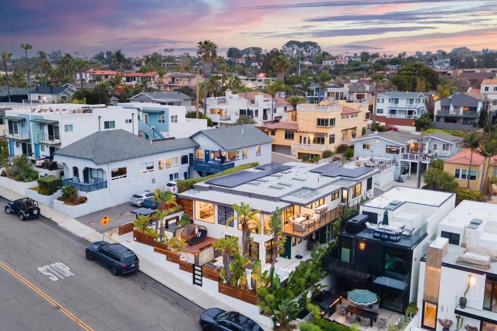 an aerial view of a city with houses at Steps to BeachShops Oceanview Hot TubFirepit Moonlight Modern by AvantStay in Encinitas