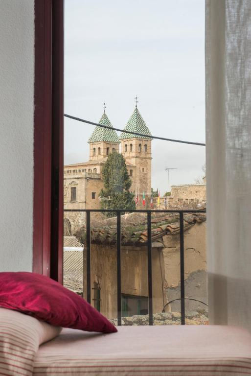 Postel nebo postele na pokoji v ubytování Hostal Sol