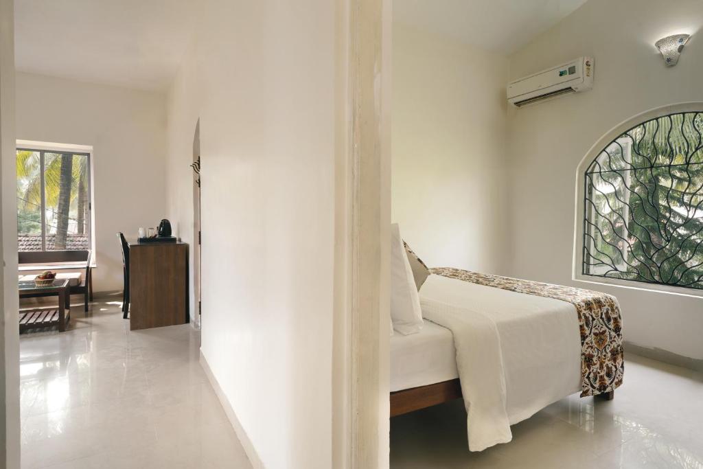 Postel nebo postele na pokoji v ubytování AM Hotel Kollection- Ivy, Morjim