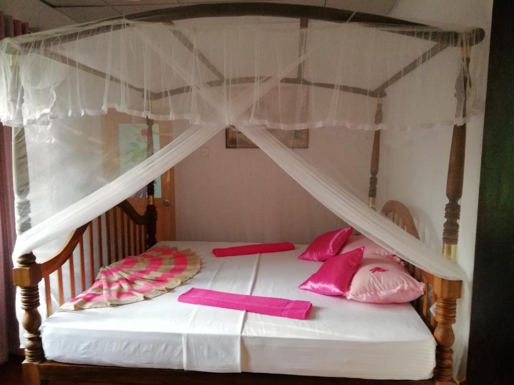 Voodi või voodid majutusasutuse New Double H resort toas