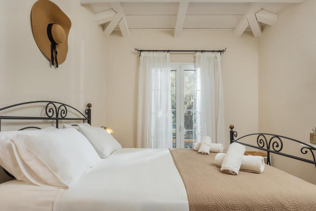 Letto o letti in una camera di Ilyessa Cottages