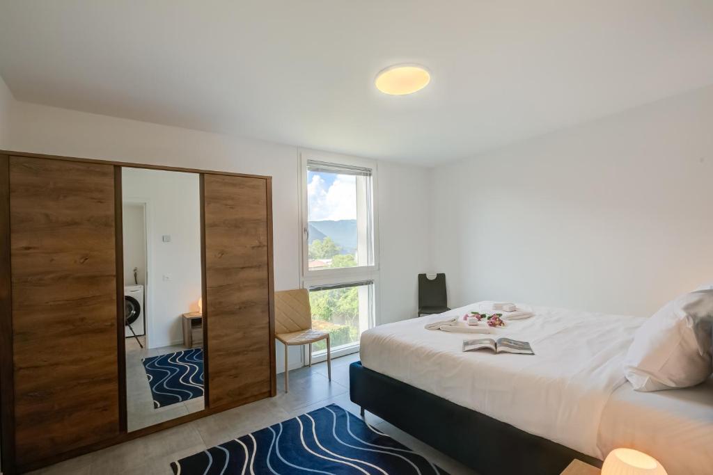 Postel nebo postele na pokoji v ubytování Melano Lab Park Apartments