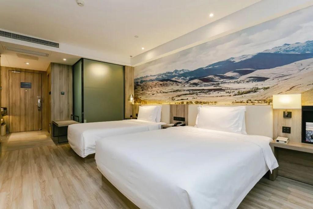 Postel nebo postele na pokoji v ubytování Atour Hotel Chengdu Shuangliu International Airport