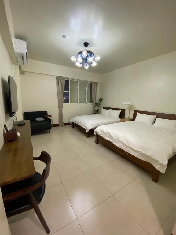 TV a/nebo společenská místnost v ubytování Fangliao 9453 B&B