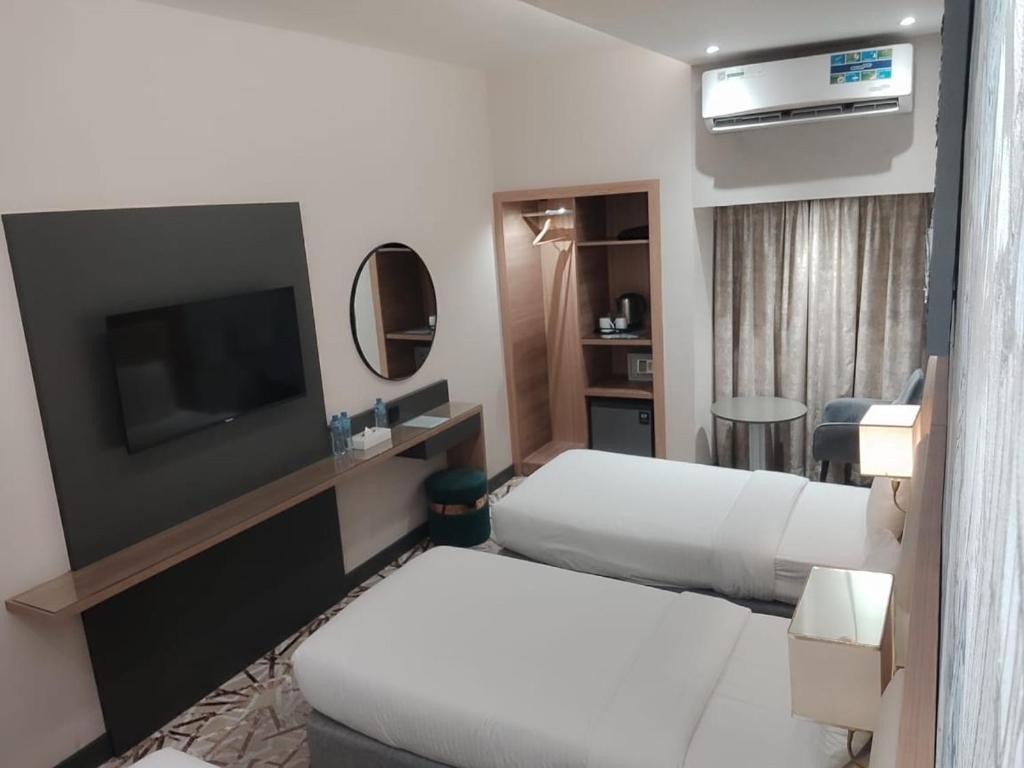 TV a/nebo společenská místnost v ubytování SKY PARK HOTEL