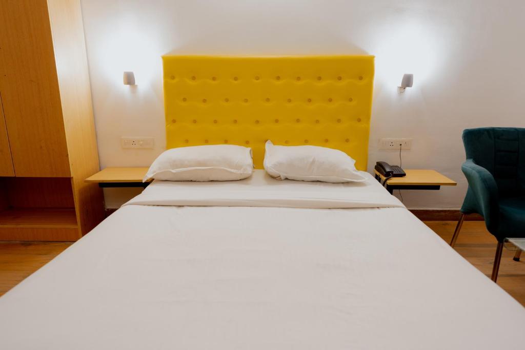 Postel nebo postele na pokoji v ubytování Jolly Panda Resort Goa