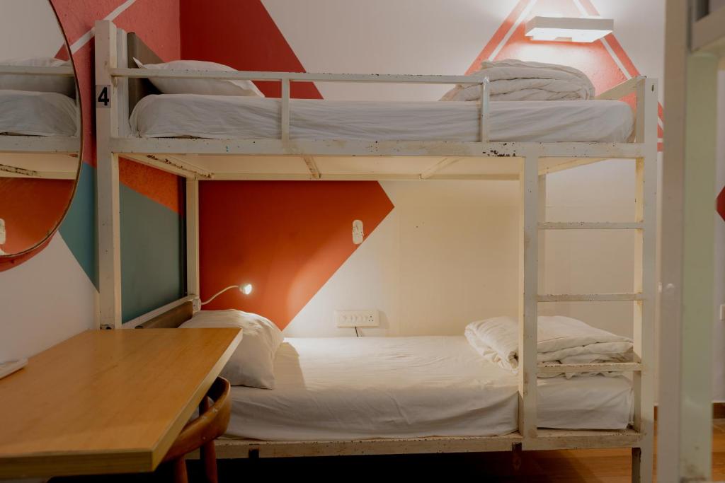 Postel nebo postele na pokoji v ubytování Jolly Panda Resort Goa