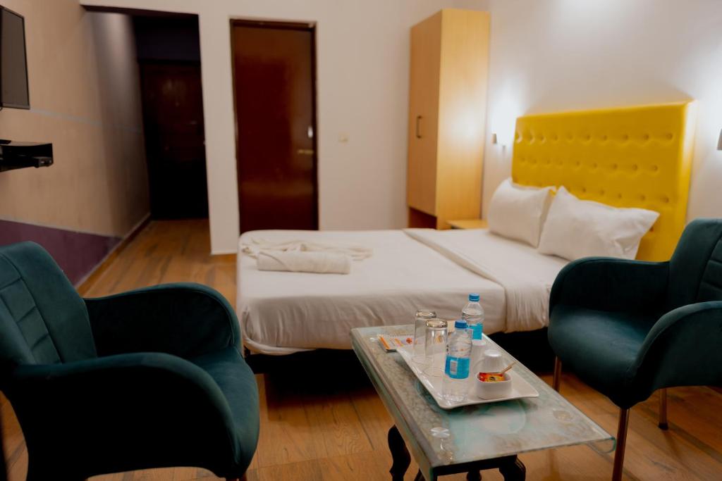 Postel nebo postele na pokoji v ubytování Jolly Panda Resort Goa