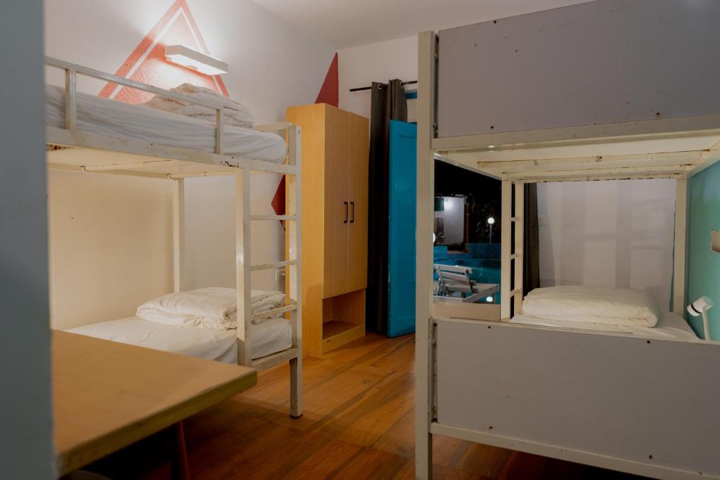 Postel nebo postele na pokoji v ubytování Jolly Panda Resort Goa