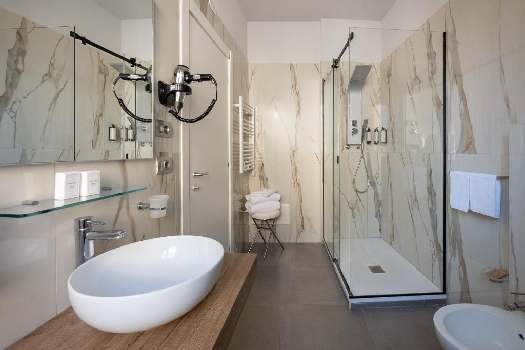 Un baño de Hotel Caravita