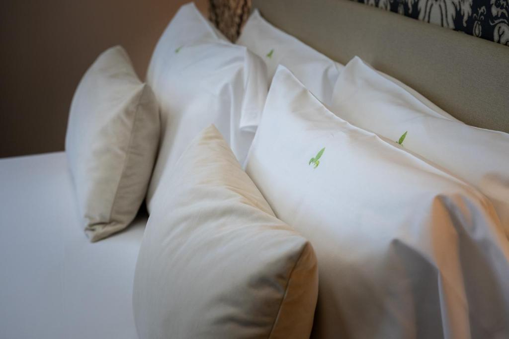 Una cama o camas en una habitación de Hotel Caravita