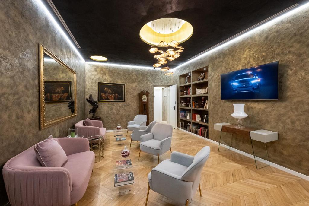 Un lugar para sentarse en Hotel Caravita