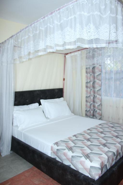 Postel nebo postele na pokoji v ubytování Ecostay 3bedroom ground floor