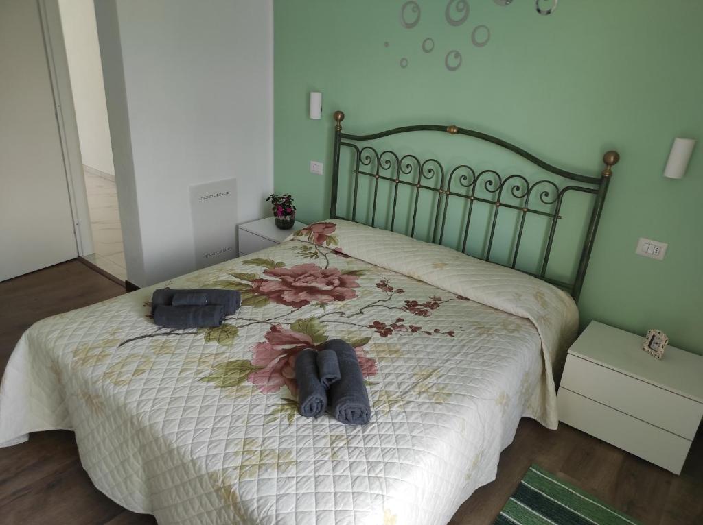 Łóżko lub łóżka w pokoju w obiekcie House Paradise