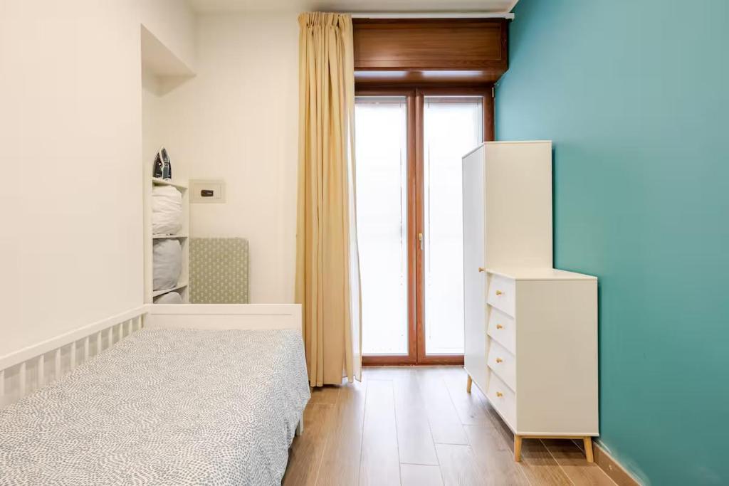 Łóżko lub łóżka w pokoju w obiekcie CRISPI 74.1 - Apartment