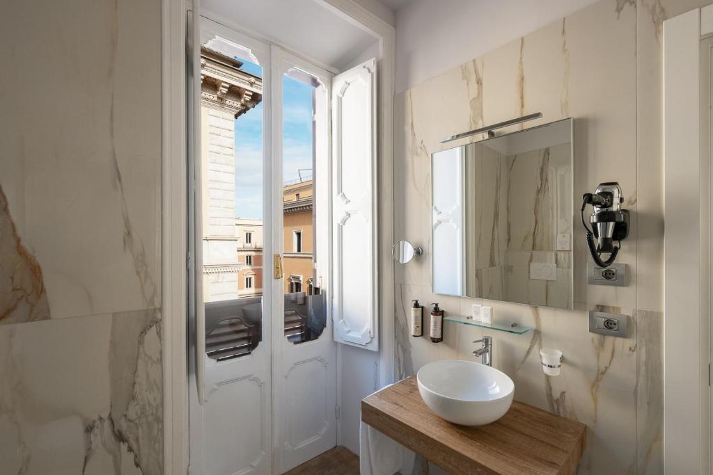 Un baño de Hotel Caravita