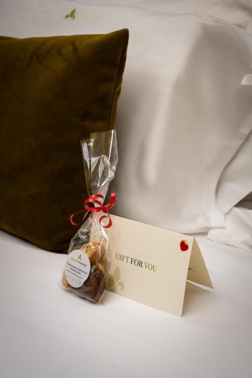 Una cama o camas en una habitación de Hotel Caravita