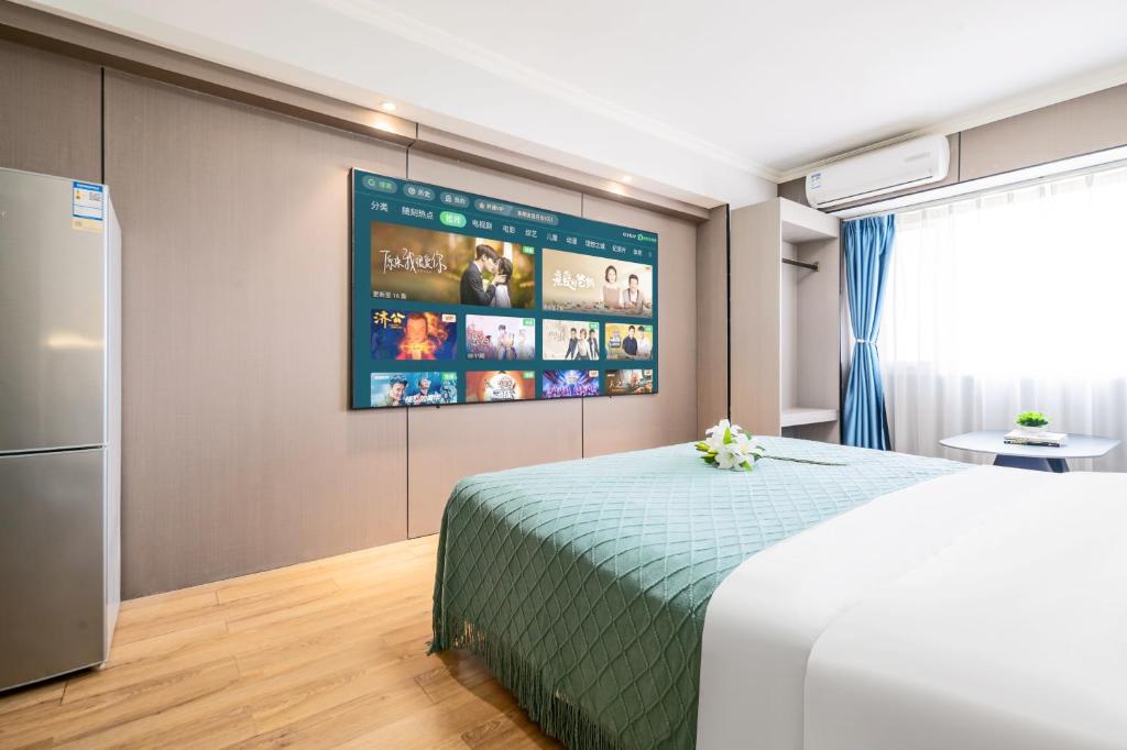 Xi'an Yongning Apartment Hotel客房内的一张或多张床位