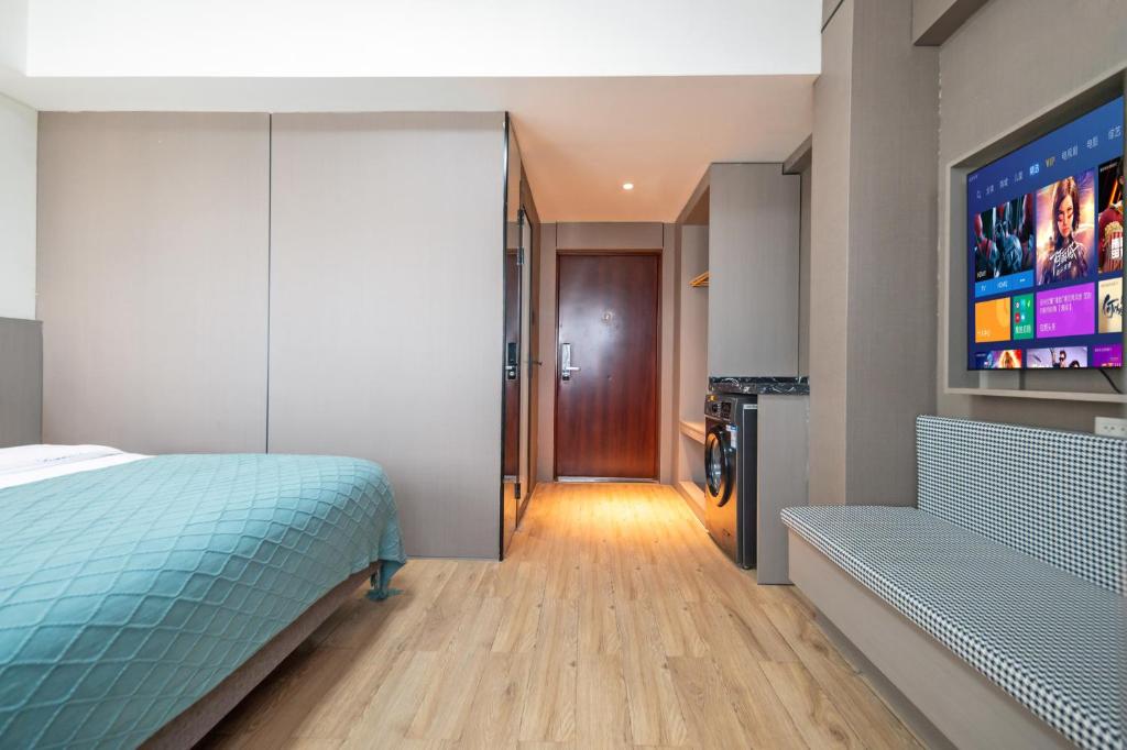 Xi'an Yongning Apartment Hotel客房内的一张或多张床位