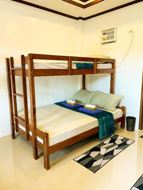 Postel nebo postele na pokoji v ubytování Hapitanan Hostel Siargao
