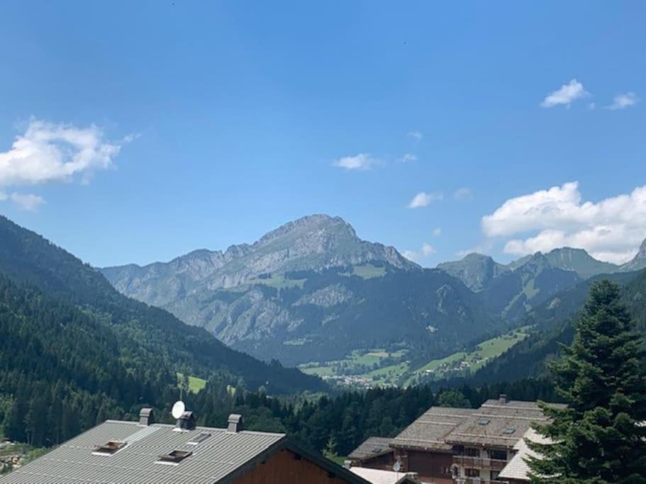 a view of a mountain range from a building at Appartement 4 personnes Châtel in Châtel