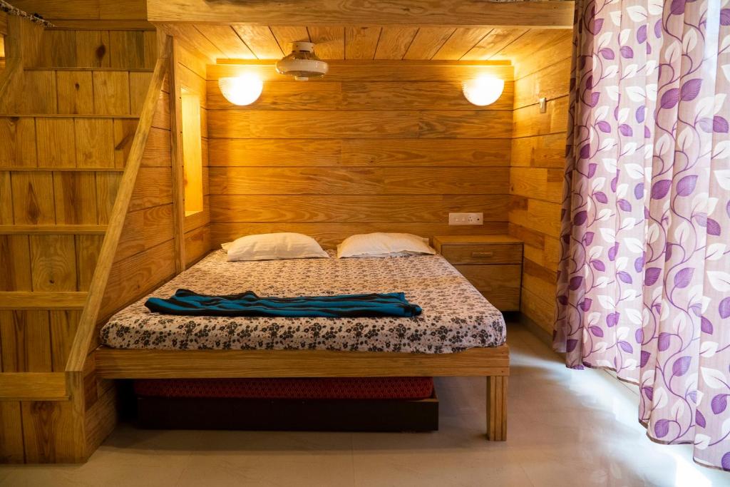 Postel nebo postele na pokoji v ubytování Godwill Casa Varca