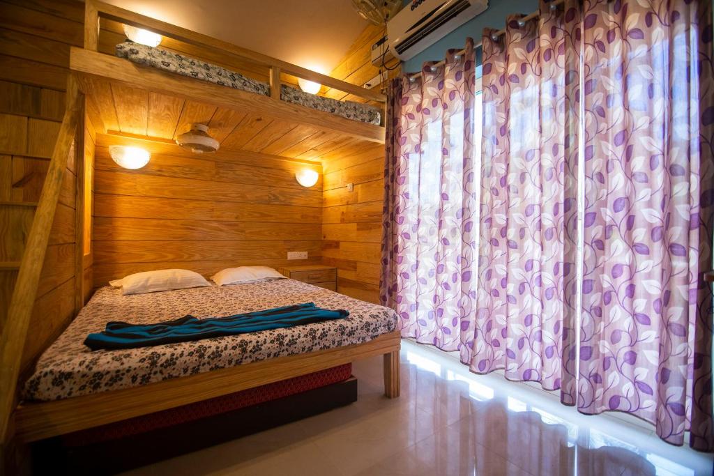 Postel nebo postele na pokoji v ubytování Godwill Casa Varca