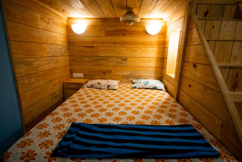 Postel nebo postele na pokoji v ubytování Godwill Casa Varca