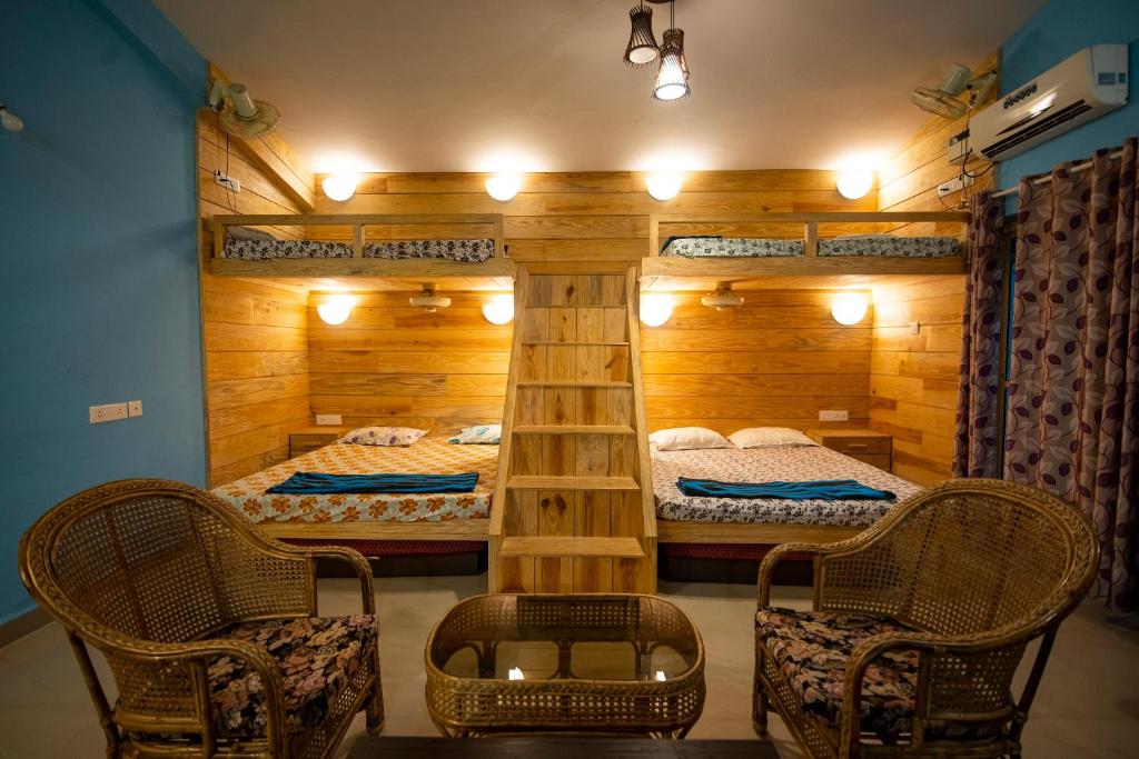 Postel nebo postele na pokoji v ubytování Godwill Casa Varca