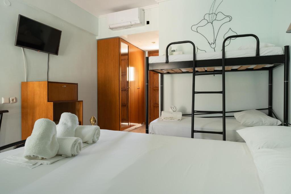 Postel nebo postele na pokoji v ubytování Hotel Makednos