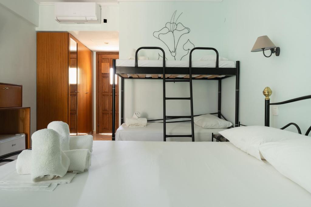 Postel nebo postele na pokoji v ubytování Hotel Makednos