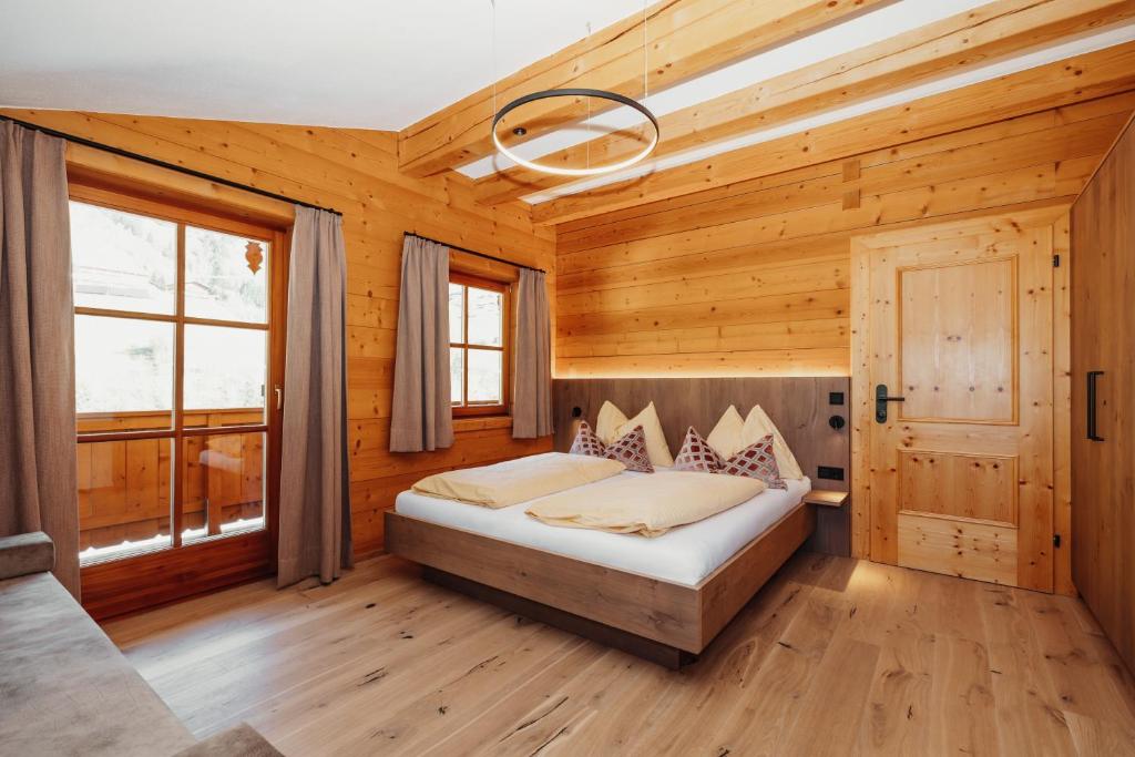 Postel nebo postele na pokoji v ubytování Hotel Lammwirt