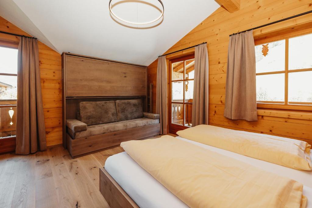 Postel nebo postele na pokoji v ubytování Hotel Lammwirt