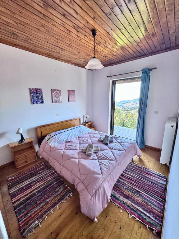 Postel nebo postele na pokoji v ubytování Casa de PavL-1