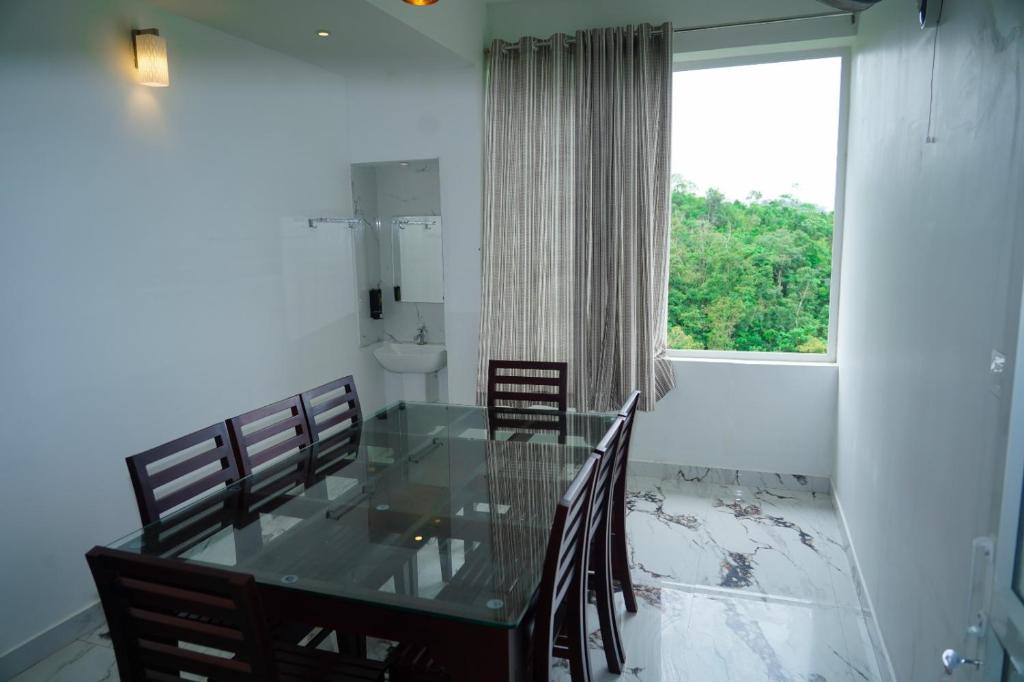 Posezení v ubytování Pinnacle Resort Vagamon