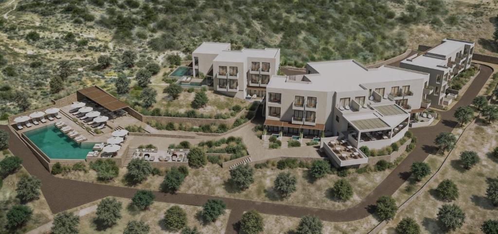 an aerial rendering of a house with a pool at Cavo Marelia in Amoopi