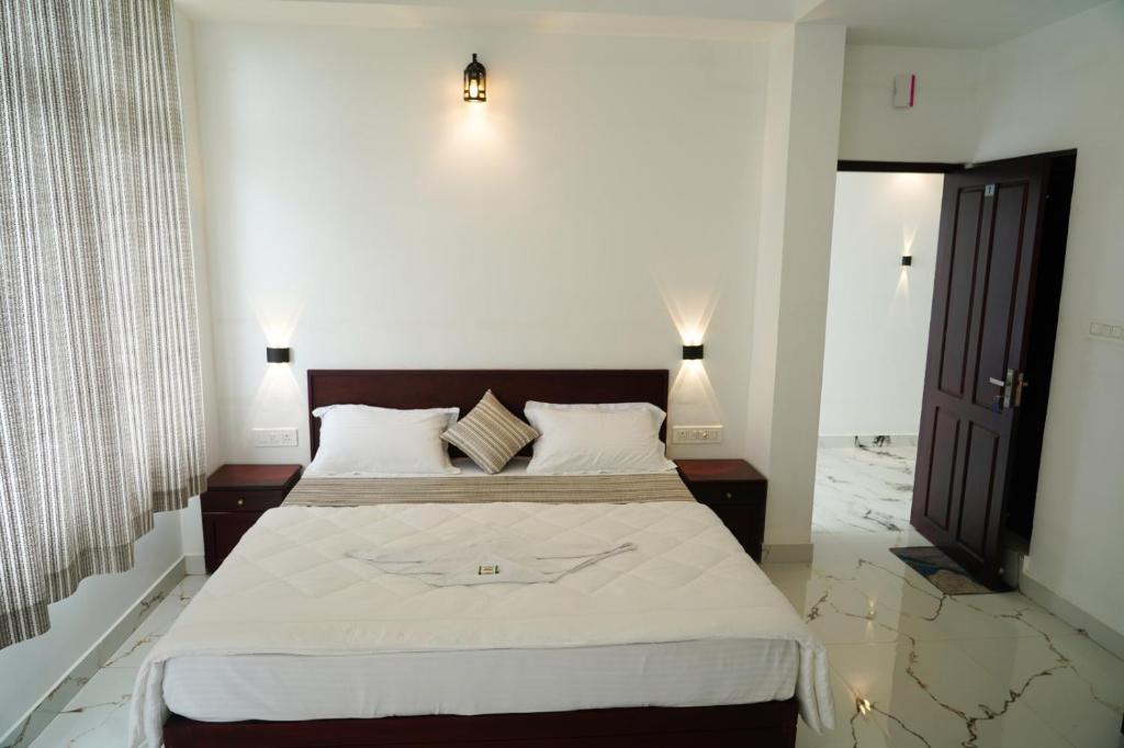 Postel nebo postele na pokoji v ubytování Pinnacle Resort Vagamon