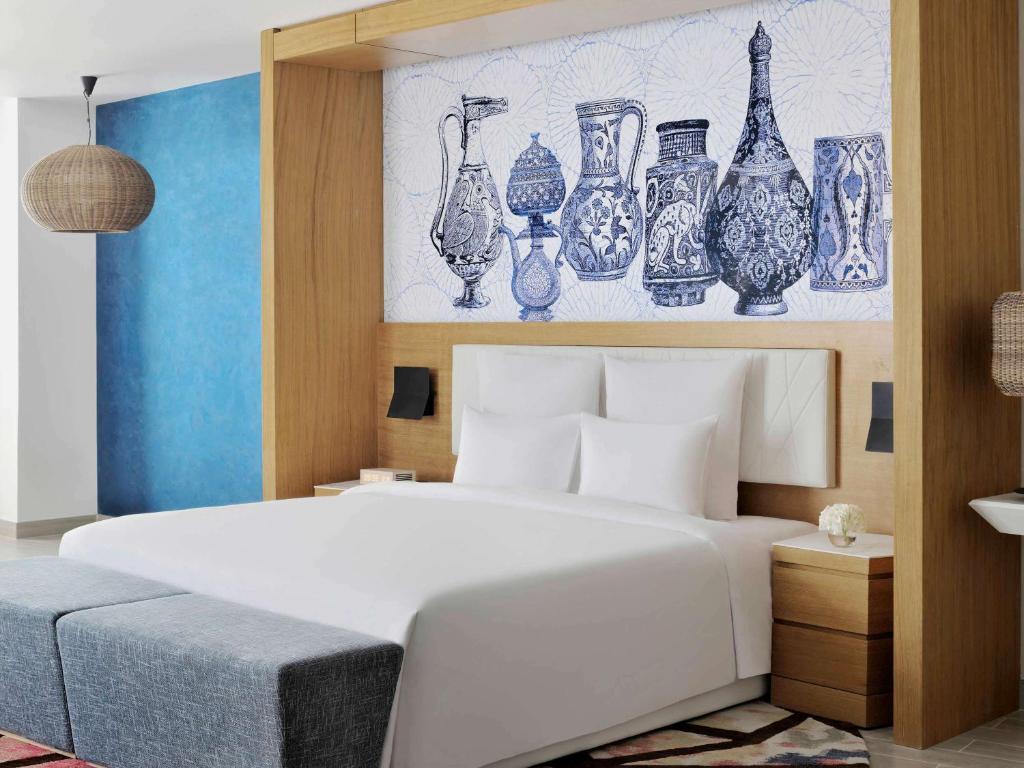 Postel nebo postele na pokoji v ubytování Mövenpick Hotel & Apartments Ghala Muscat