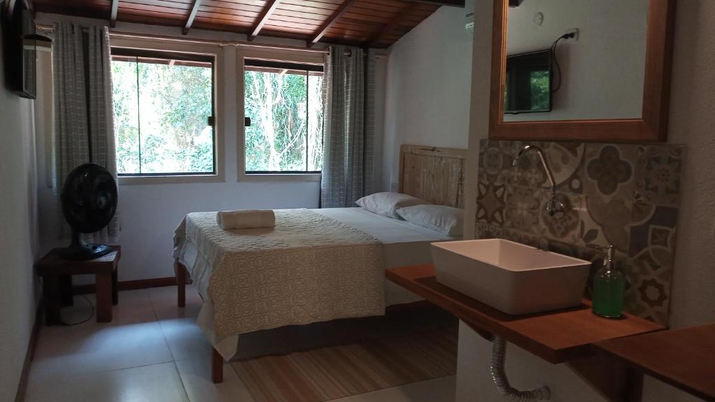 Postel nebo postele na pokoji v ubytování Pitanga Ilha Grande