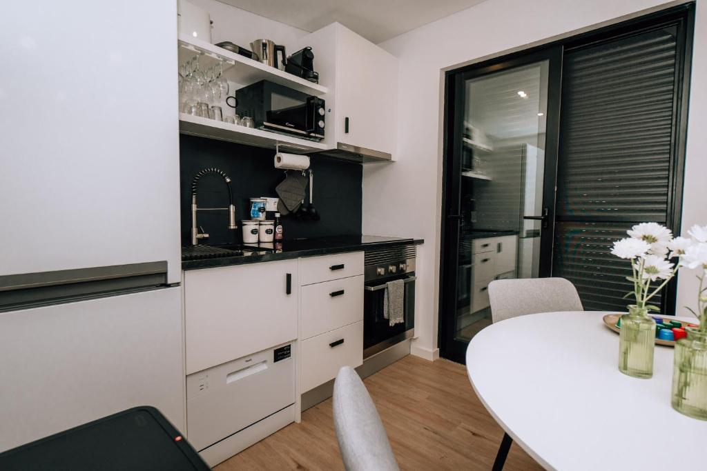Kuchyň nebo kuchyňský kout v ubytování Azores Smart Studios