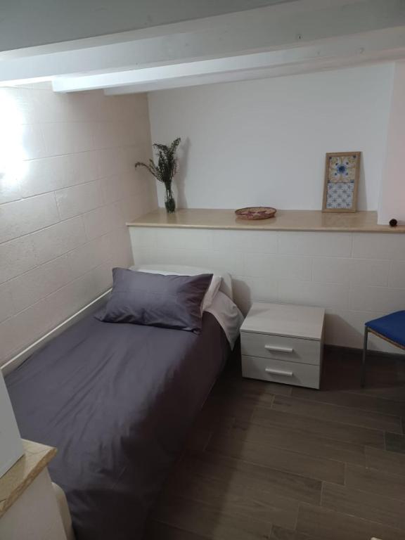 Posteľ alebo postele v izbe v ubytovaní Casa Antonella
