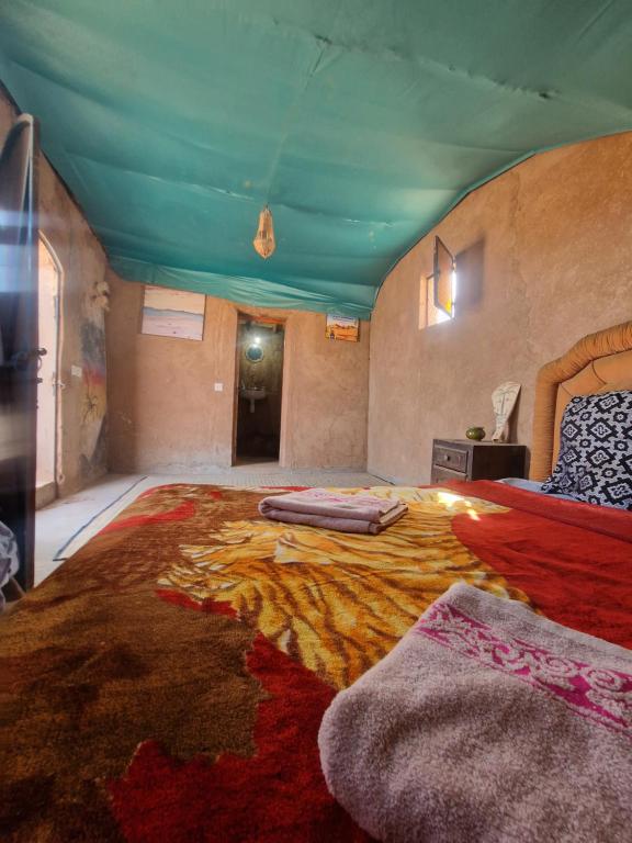Postel nebo postele na pokoji v ubytování Camel House camp
