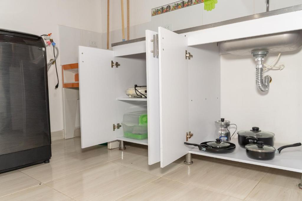 Kuchyň nebo kuchyňský kout v ubytování Home Sweet Home