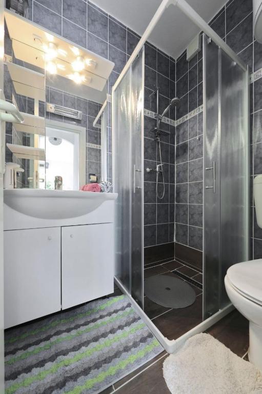Kúpeľňa v ubytovaní Apartments Djurdja