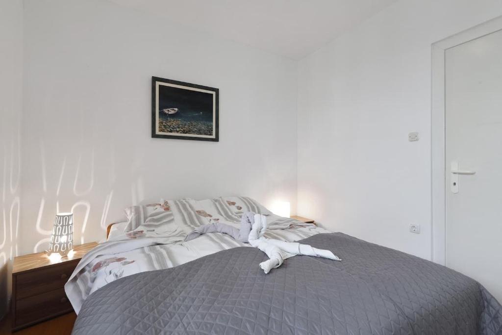 Posteľ alebo postele v izbe v ubytovaní Apartments Djurdja
