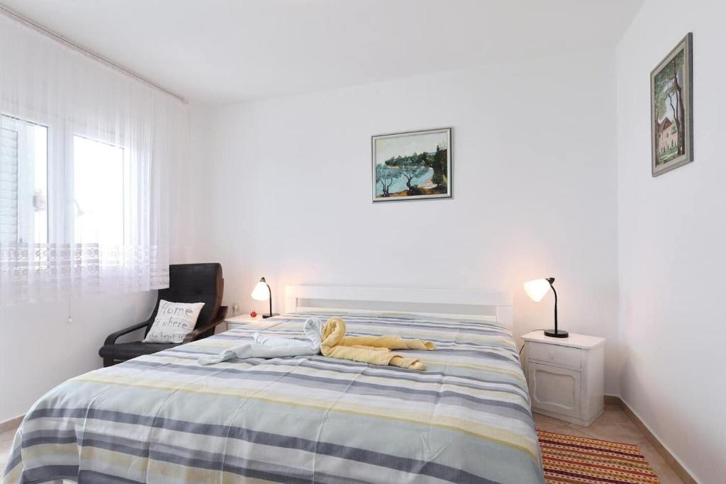 Posteľ alebo postele v izbe v ubytovaní Apartments Djurdja
